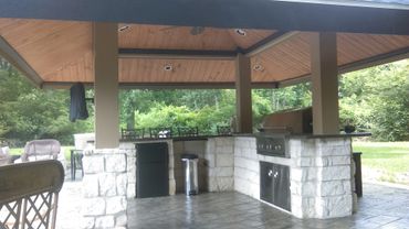 Luxurious cabana with built-in kitchen designed by The Patio Kings