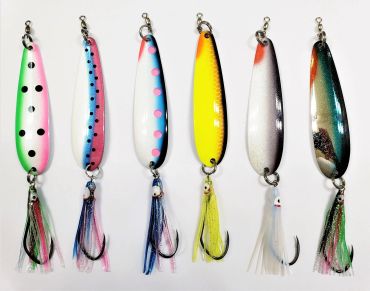 Colorful fishing lures arranged in a row.