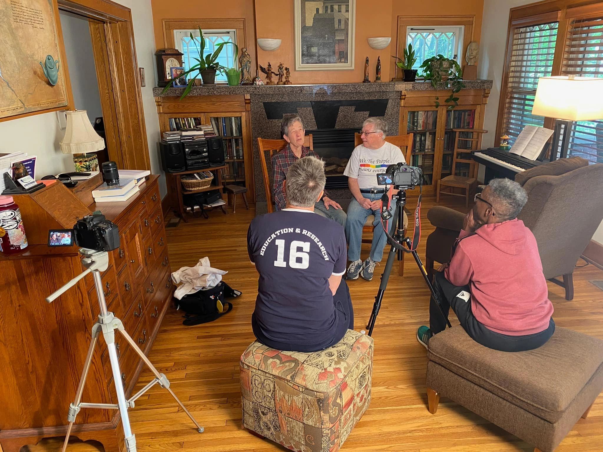 Filmmakers interviewing a lesbian couple in their home.