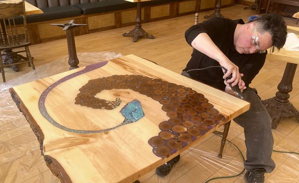 Alex Allington at work making hand made, custom, live edge, river table.