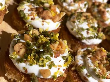 Crostone with Whipped Ricotta, Almonds, Olives and Lemon Zest
