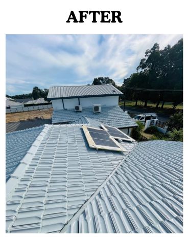 Clean white tiled roof with solar panels.