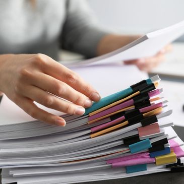 Woman searching through documents
