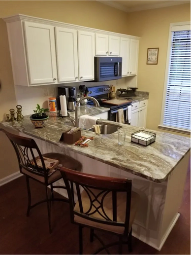 white kitchen cabinets and quartz countertops
