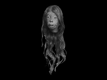 Long haired female tourist trade shrunken head named Lilith
