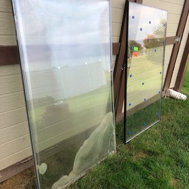 Discoloration and moisture inside of the glass due to seal failure. Serviced near me in Suamico, WI.