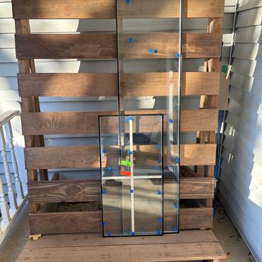 New window glass waiting to be installed near me in Bellevue, WI.