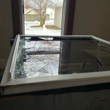 Broken double pane window replacement near me in Green Bay, WI. Double hung window repair service.