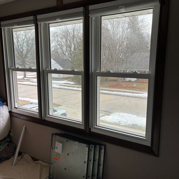 Fogged window glass replacement near me in DePere, WI. Window repair serviced on vinyl window.