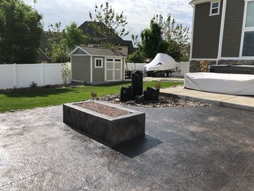 Poured in place concrete fire pit, Copper glass, Natural Gas, rectangular, linear