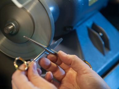 surgical instrument repair scissor sharpening