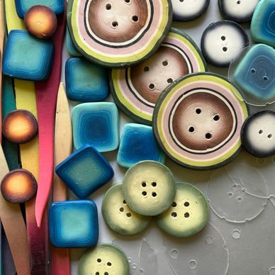 Colorful sewing buttons and tools.