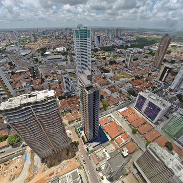 Fachada de edifício residencial. Imagem 3d  com foto-inserção sobre foto aérea, em João Pessoa-PB