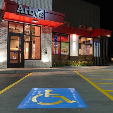 Parking Lot striping and painting for fast food chain.