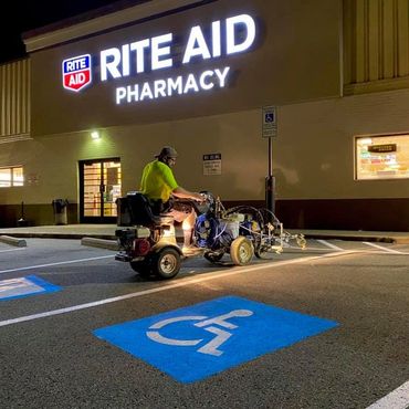 Parking lot painting and striping with ada parking stalls