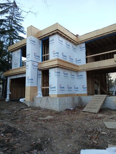 Modern house under construction with Tyvek HomeWrap.