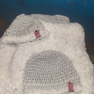 Reversable snuggle sack with fur lining. 
2 hats for 1st child and new edition photoshoot