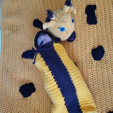 Animal themed blanket and snuggle sack for adorable photoshoot
