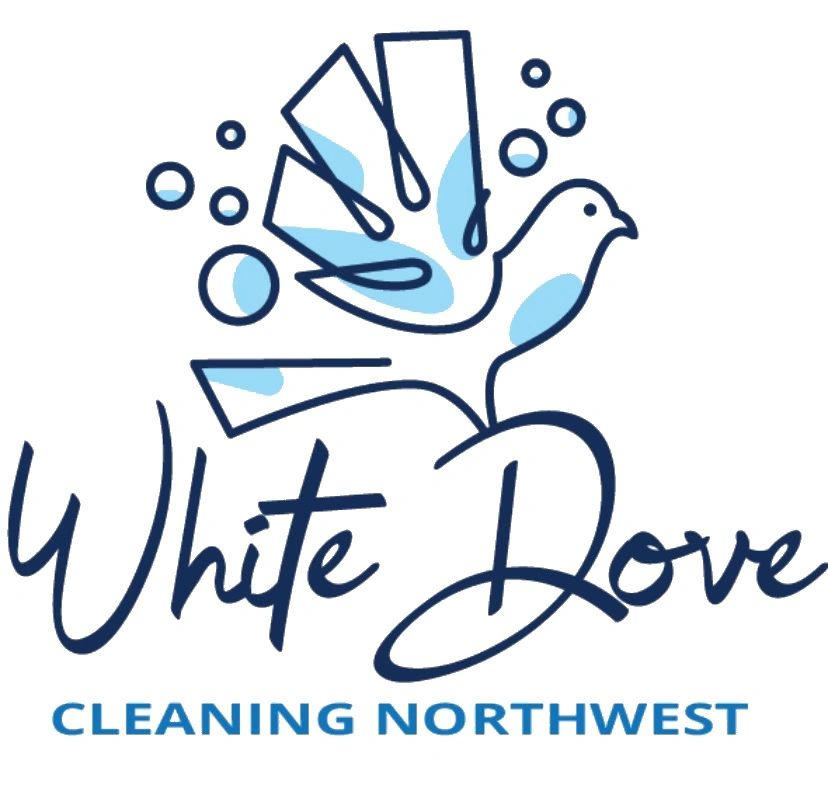 White Dove Cleaning Northwest logo with a white bird sitting over the text.