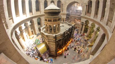 Church interior with many visitors.