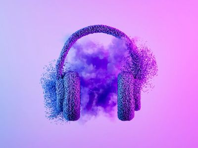 Headphones dissolving into colorful particles on a purple background.