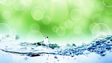Green and blue image with water on the bottom and green bubble background | Micronic Technologies
