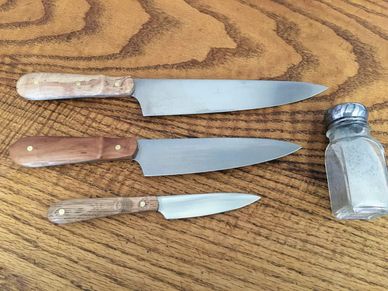 Custom kitchen knives with Maple, Cherry and Oak handles