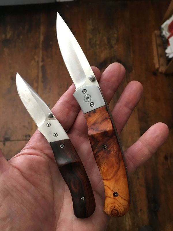 Custom folding knives with Cocobolo and Yew handles