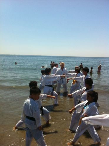 Group of kids practicing karate