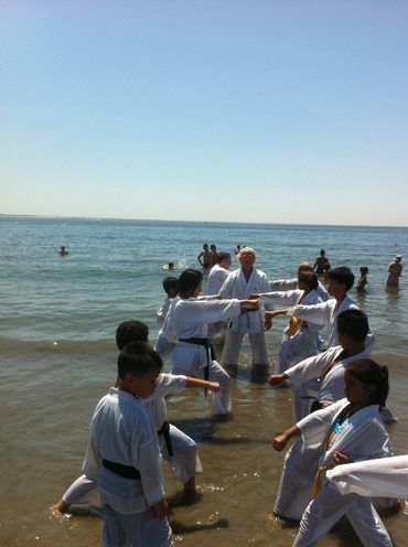 Group of kids practicing karate