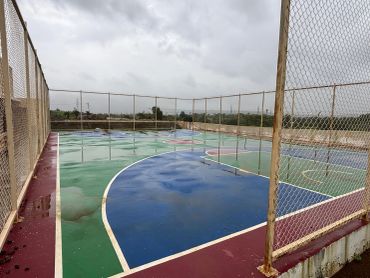 Empty outdoor basketball court on a rainy day.
sports facility and basketball court in gated na plot project third mumbai
mumbai third properties
sankalp meadows
riyasat infra
riyasat