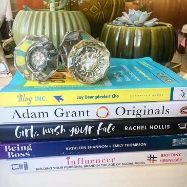 Vintage Glass door knobs, vintage planters with succulents, books for self improvement