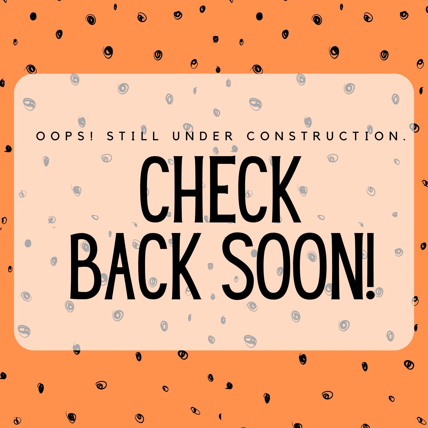 Under construction sign with orange and black design.