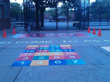 Number grid playground game made from preformed thermoplastic on concrete by surface signs of NY