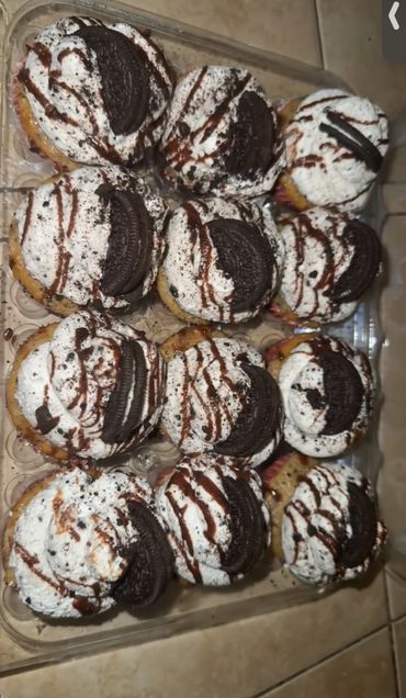 These are a vanilla cupcake with Oreo pieces with Oreo whipped cream topping!