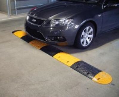Car approaching a Quik-Response portable speed bump