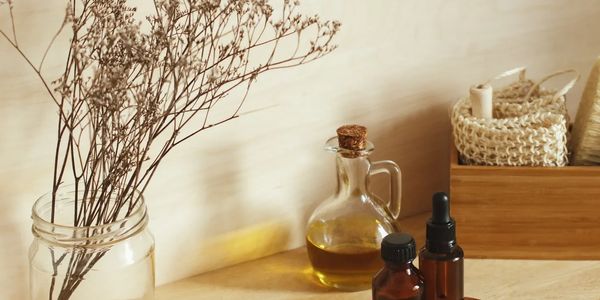 Spa essentials in calming neutral tones representing prenatal massage at Wholly Spirit Hands.