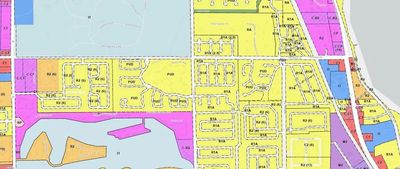 A colorful zoning map showing different land uses in a coastal area.