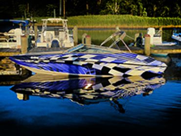 Completely custom color change with graphics on speed boat with 3M wrap material