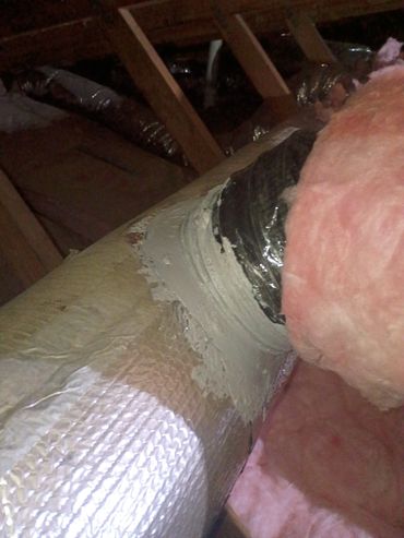 Ductwork sealed with insulation and mastic in an attic space.
Hartville,MO
