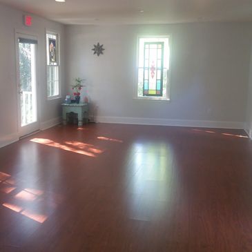 Our sunlit and spacious yoga room where we offer yoga for all levels.