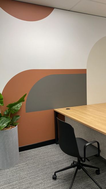 Warm colours of firebrick and beige contrast with cool shades of grey.