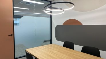 Warm colours of firebrick and beige contrast with cool shades of grey.