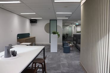 High breakout table in office setting.