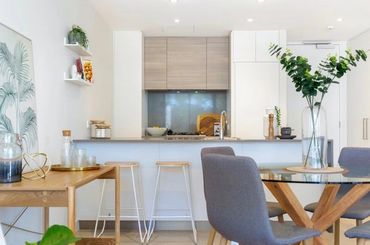 Open plan kitchen and dining area.