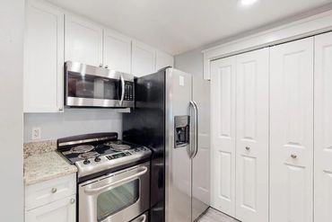 Full Size Refrigerator, Stove, Dishwasher, and Microwave