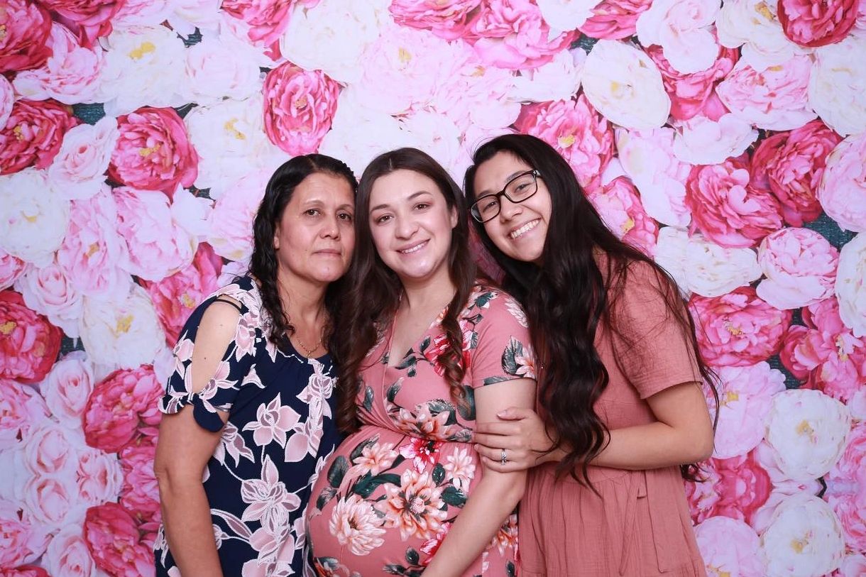 At a baby shower with one of our backdrops (peony wall)