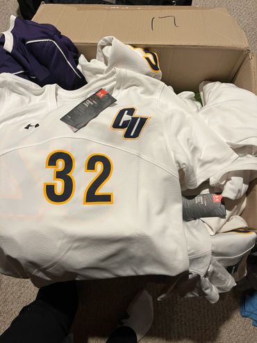 Soccer jersey and sporting equipment donated to start a soccer club for the children of Liberia