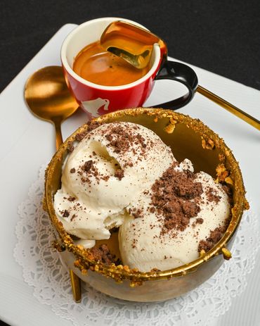 Italian affogato dessert with vanilla gelato and espresso shot at Mangia E Bevi
