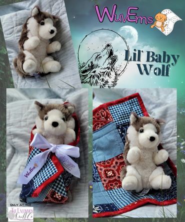 Wolf or Husky swaddled in quilt.